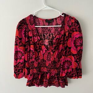 House of Harlow 1960 Red and Black Graphic Smocked Peplum Blouse
